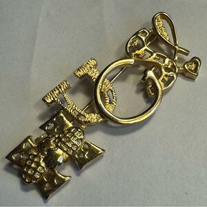 HUGS Gold Tone Brooch